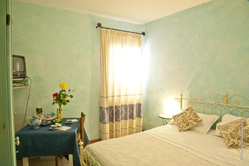 Bed And Breakfast Li Paduli Alvi Cannigione Buitenkant foto